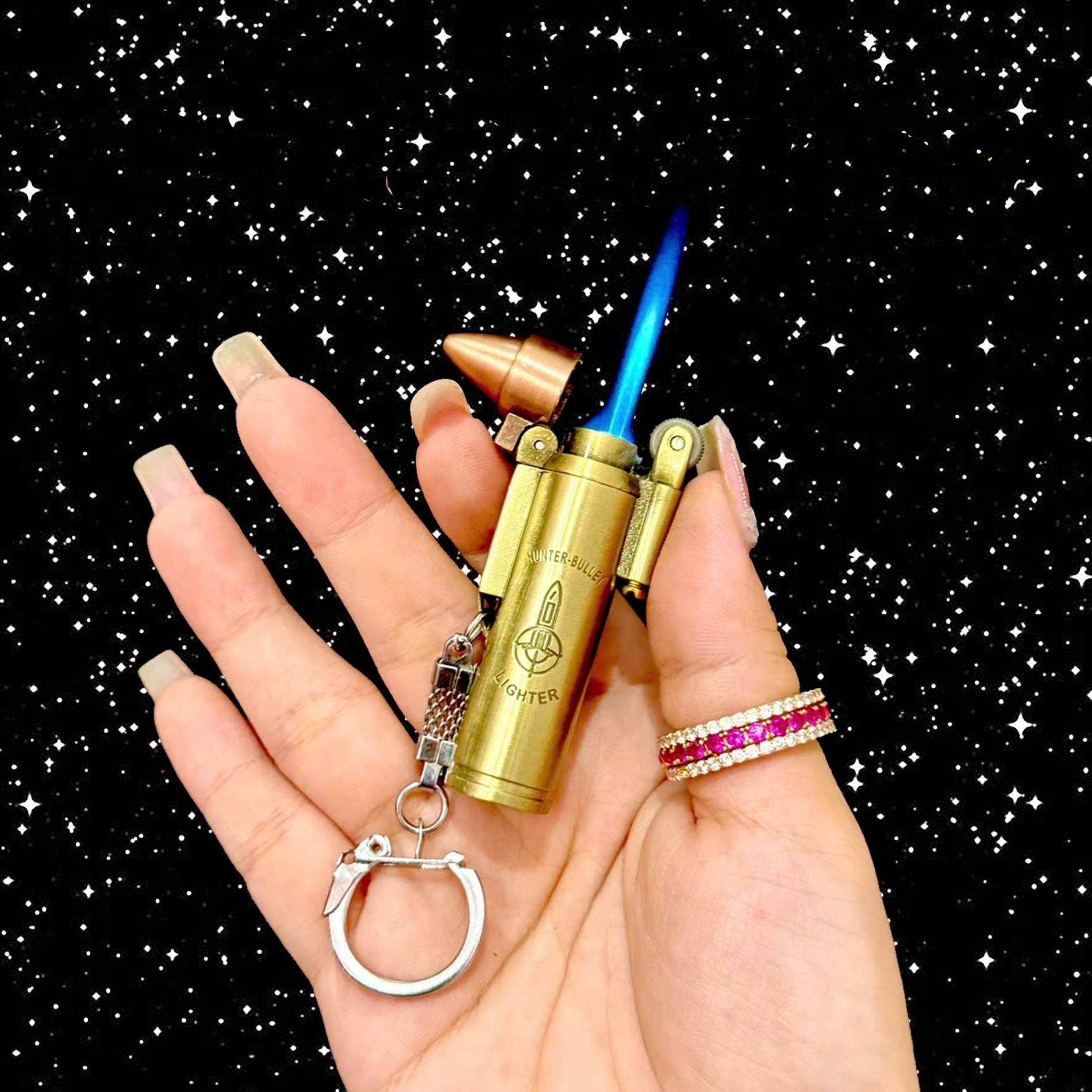 Bật lửa hình viên đạn lửa khè rãnh tay xài gas có móc khóa